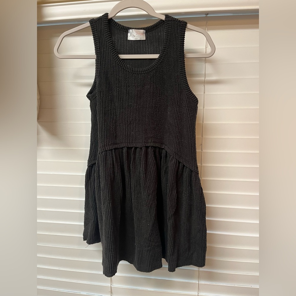 Black sleeveless babydoll top; size small
